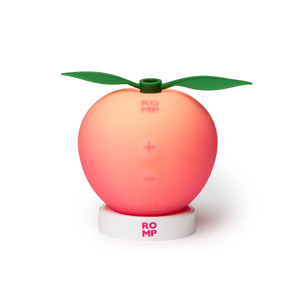 ROMP Pink Peach stimulator showing air-pulse mouthpiece opening
